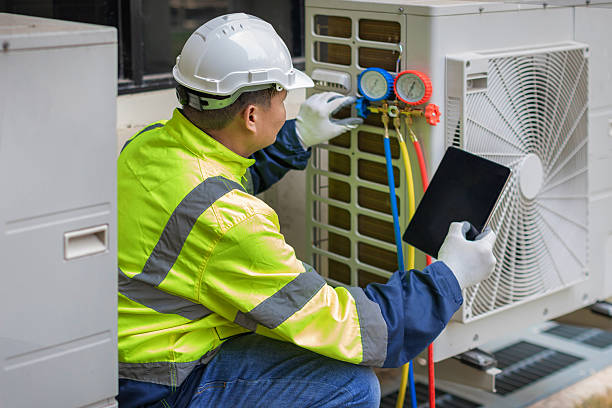 Professional Heat Pump Repair technician working in Godley, TX